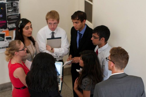 Delegates from the Myanmar committee meet in an unmoderated caucus.