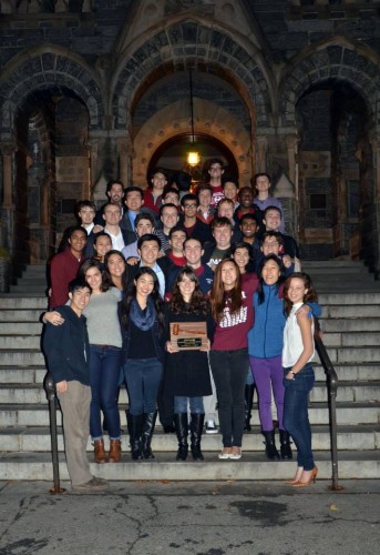 Georgetown poses with their Outstanding Small Delegation honors on the steps of Healy Hall on campus.