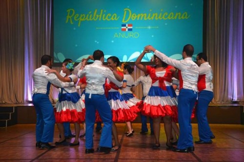 UNA-DR Staff dances to folkloric songs of the Dominican Republic during Cultural Encounter.