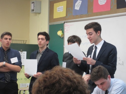 Delegates in the Ukraine Emergency Summit read out their working paper to the general committee.