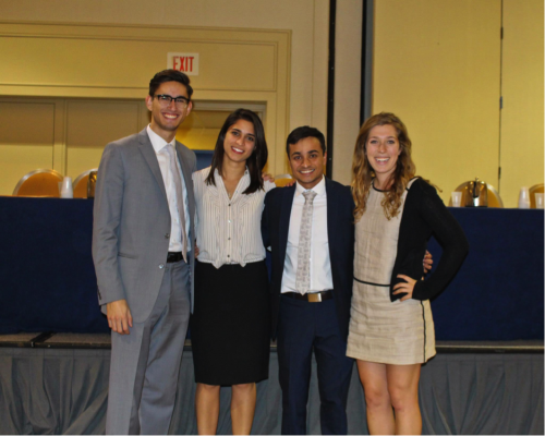 Chief Operating Officer Paul Marvucic, Director-General Haley Zarrin, Secretary-General Ashu Goel, and Chief of Staff Eliza Rothstein pose for a picture at closing ceremonies.