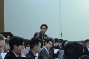 A UNGA delegate delivers a speech to committee