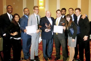 The Florida International University Delegation poses with their awards